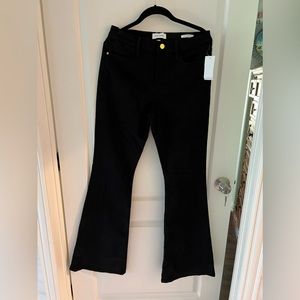 Black flare jeans. Never worn.